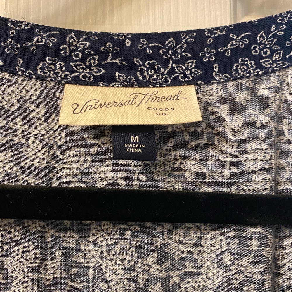 Navy Floral Jumpsuit - Picture 2 of 5
